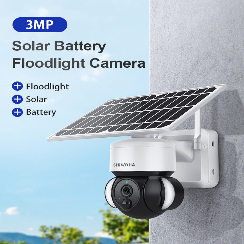 Solar battery floodlight camera with solar panel on a wall, featuring SHIVANNA branding.